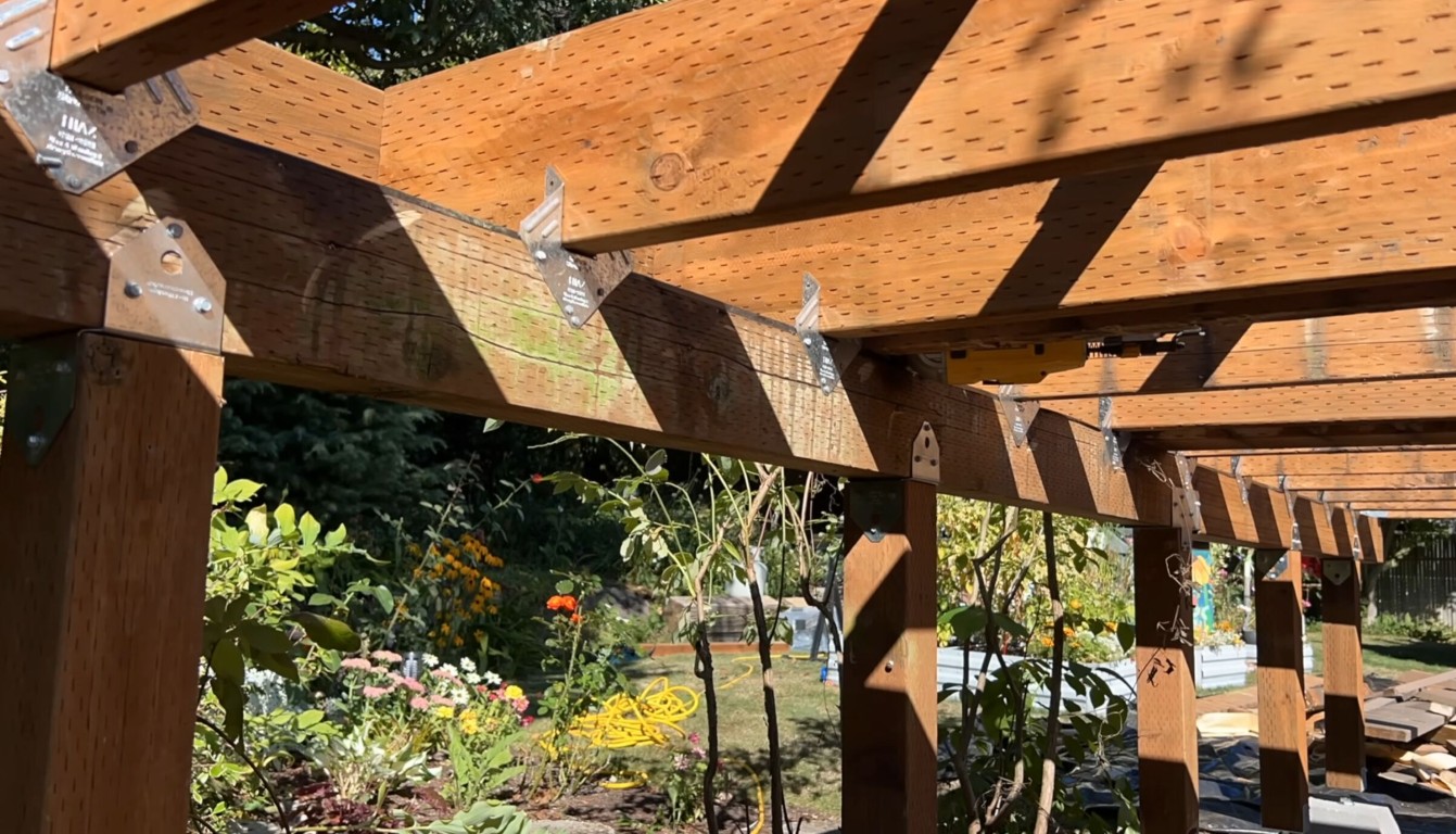 Custom pergola and patio cover construction in Hawthorne backyard